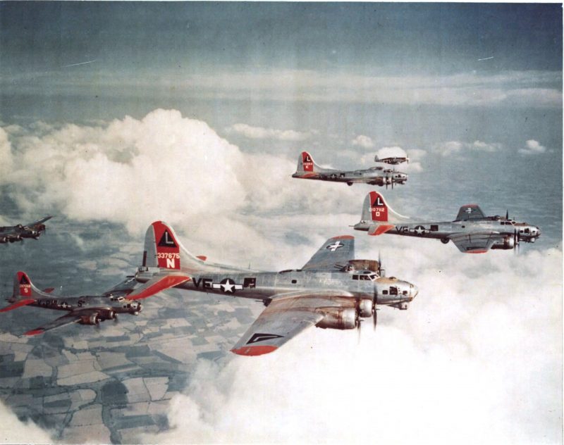 B-17 Flying Fortresses of the 381st Bomb Group, escorted by P-51B fighters of the 354th Fighter Squadron in 1944